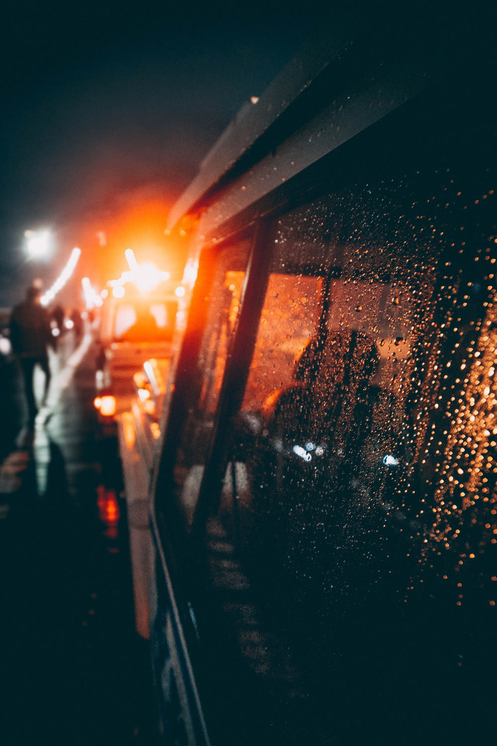 rainy car window in stopped traffic