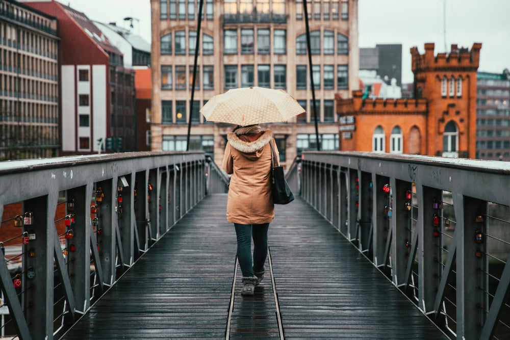 rainy walk on bridge