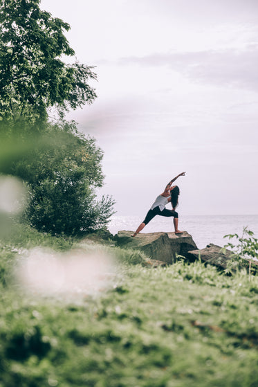 reaching yoga pose in nature