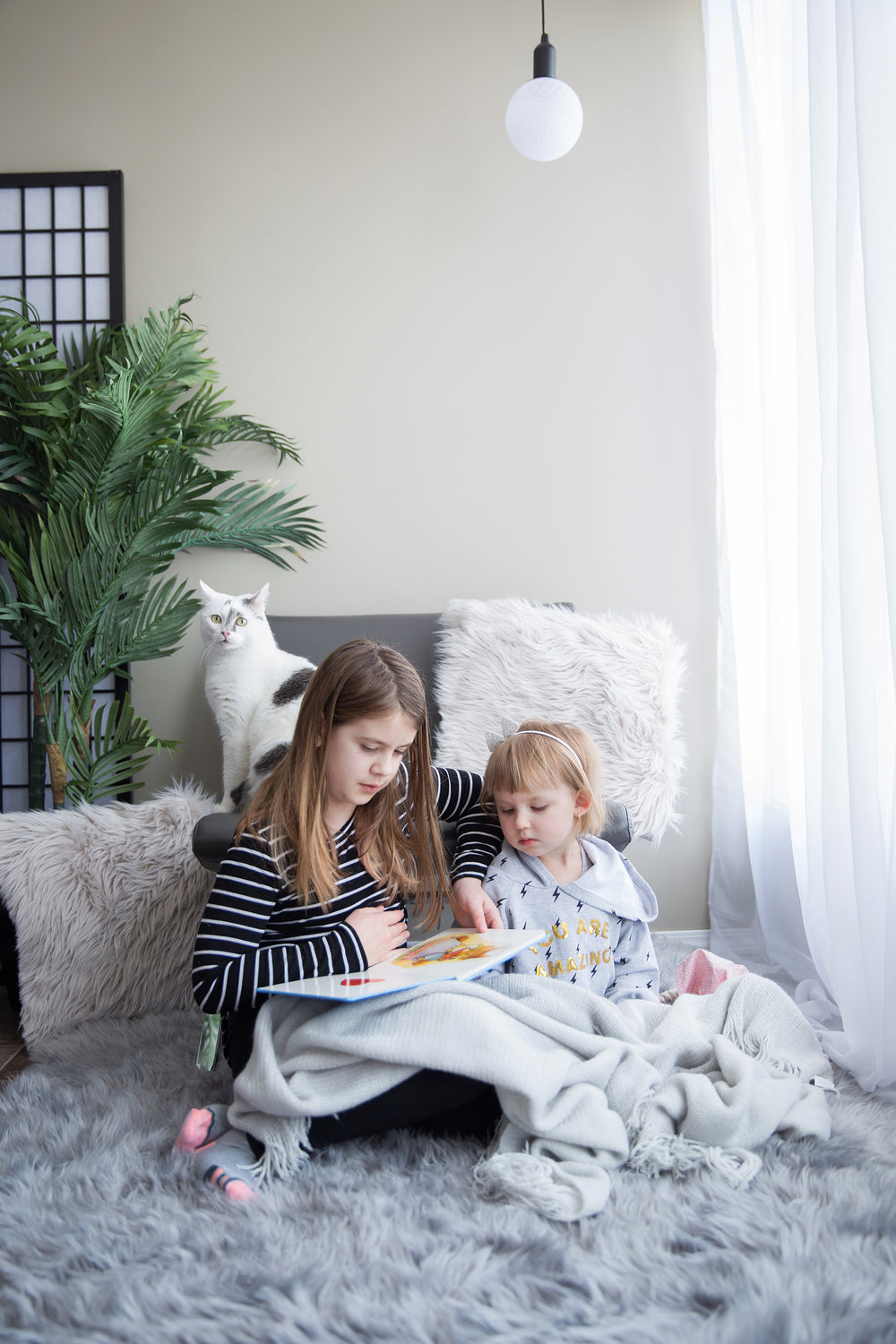 reading time under a blanket