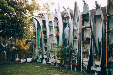 reclaimed canoes as garden decor