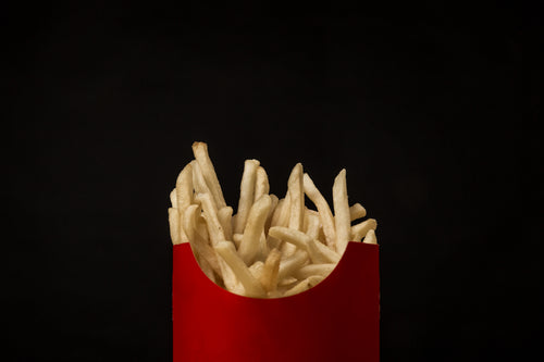 red box french fries on black