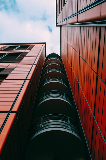 red building and black tower