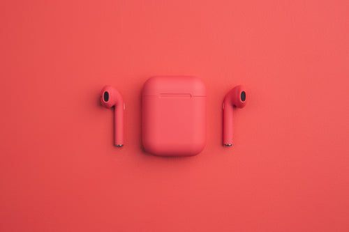 red earbuds and smartphone