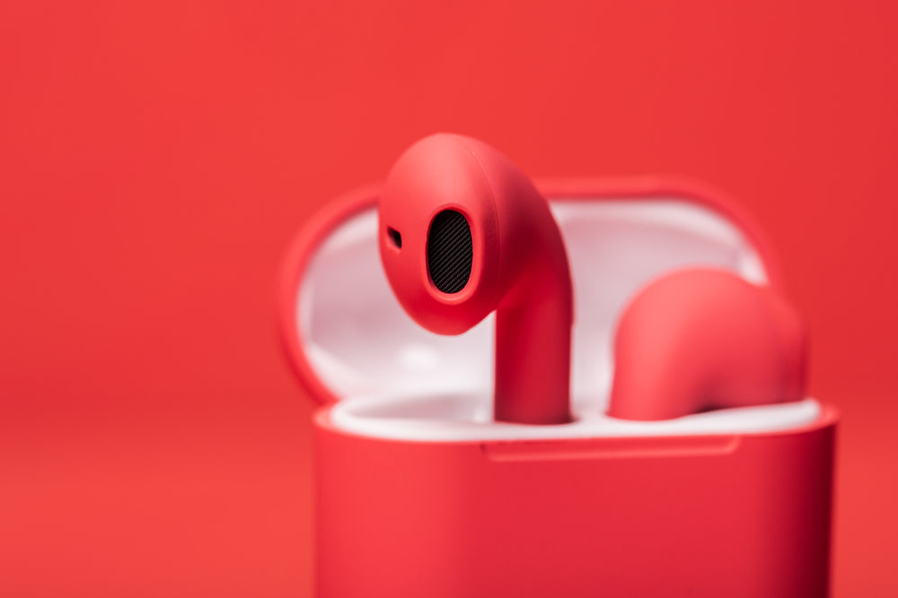 red earbuds in case