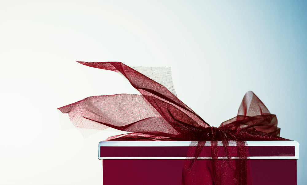 red gift with ribbon