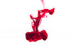 red ink drop on white