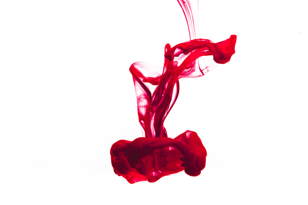 Red Ink Drop On White