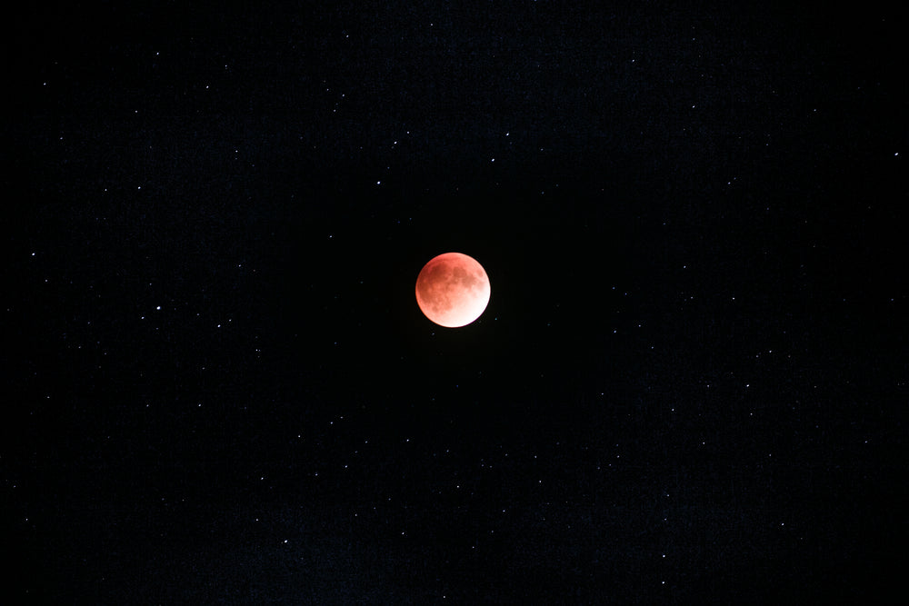 red moon and stars