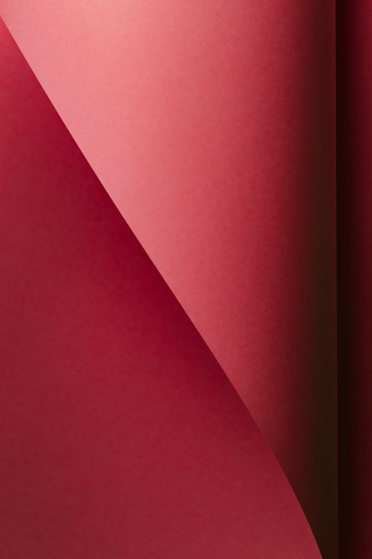 red paper curves to make an abstract gradient