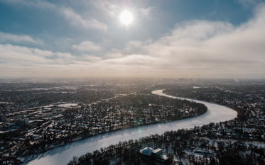 red river curving through winnipeg on a sunny winter day