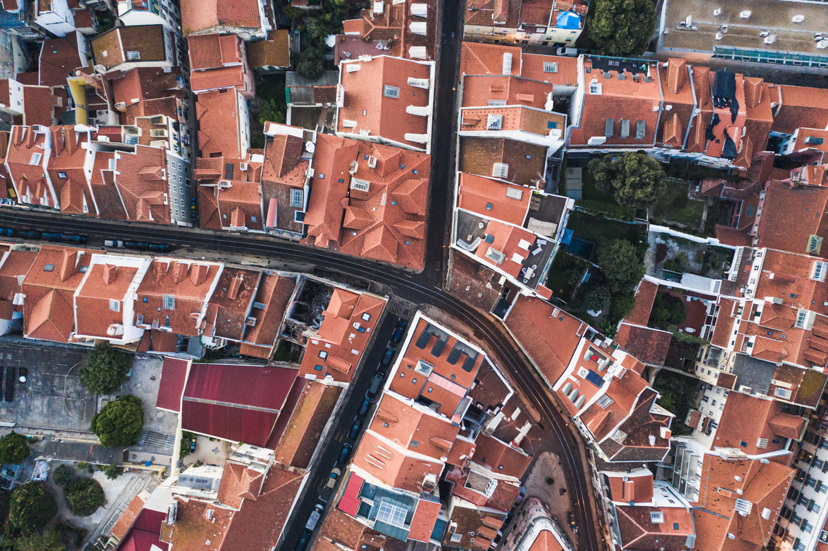 red rooftops and curved streets of lisbon portugal