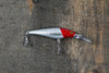 red & silver fishing lure