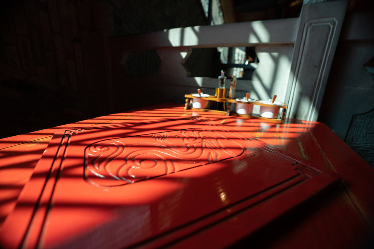 red-table-with-carved-inlay-is-bathed-in-sunlight.jpg?width=746&format=pjpg&exif=0&iptc=0