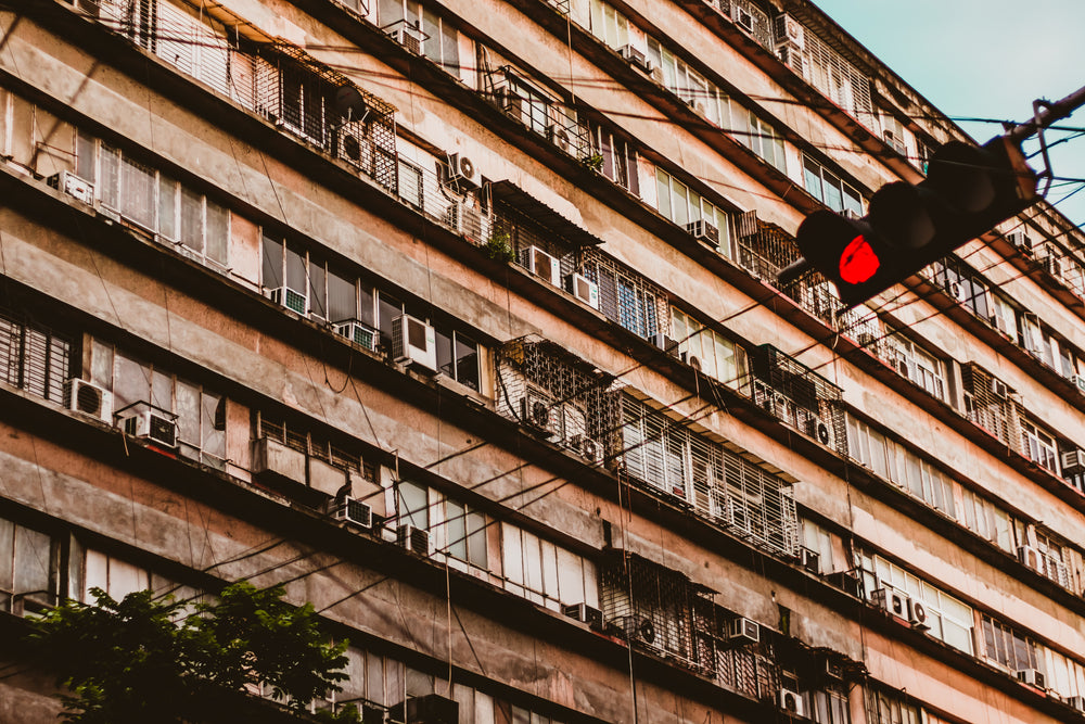 red traffic light and building