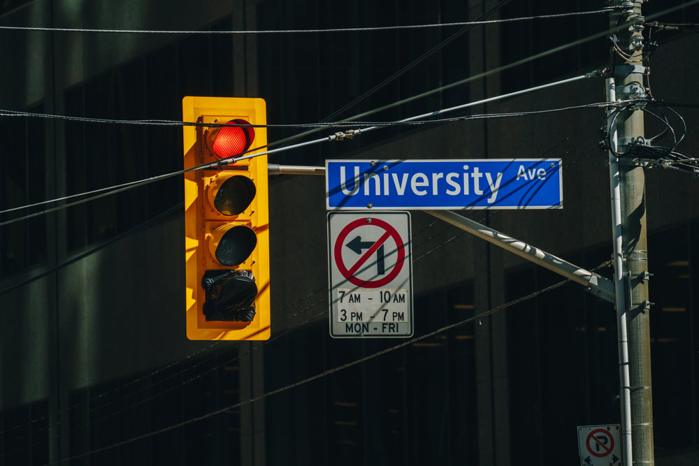 red traffic light & street sign