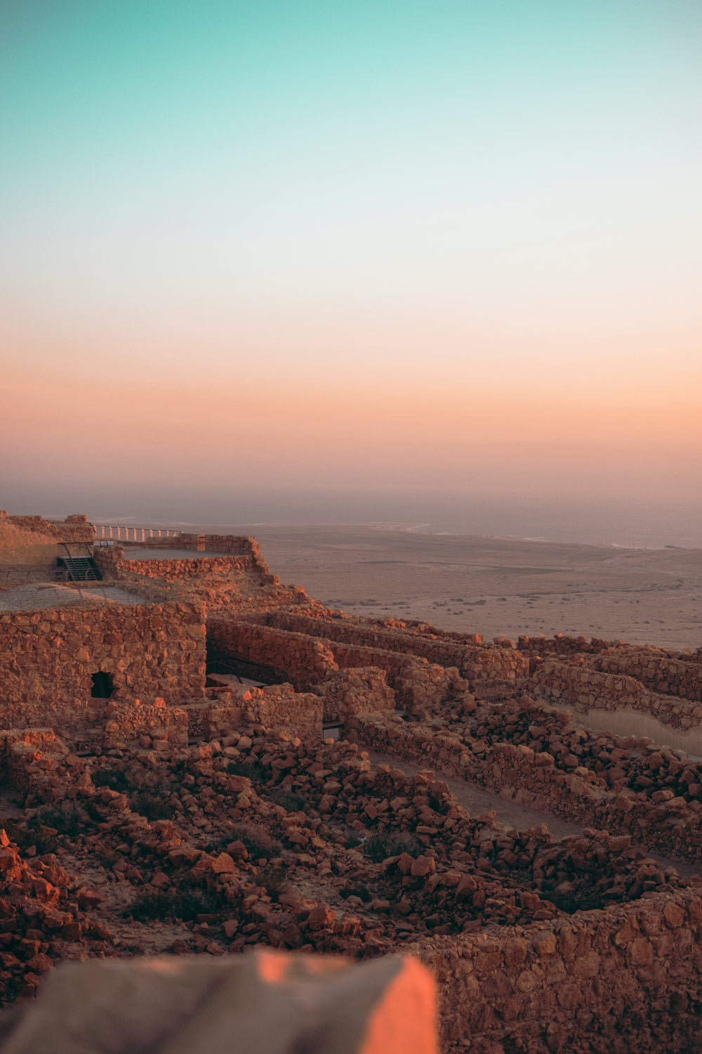 remains of stone buildings at golden hour