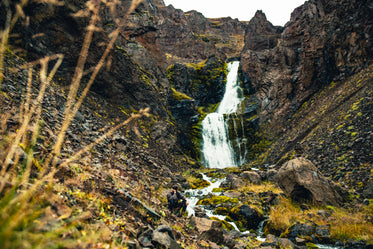 resting by galcier waterfall