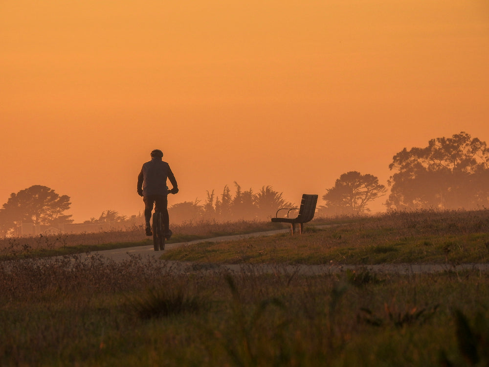 riding a bike at dusk