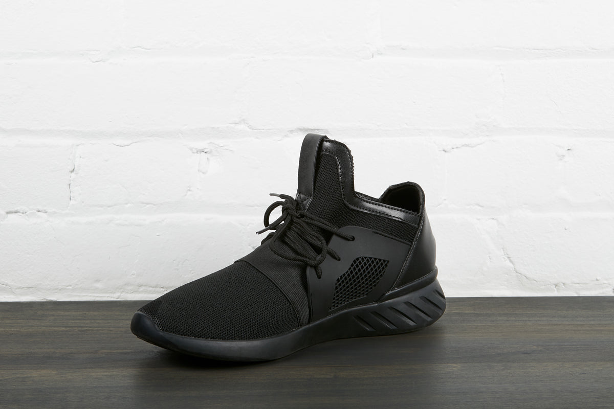 right foot all black sneaker