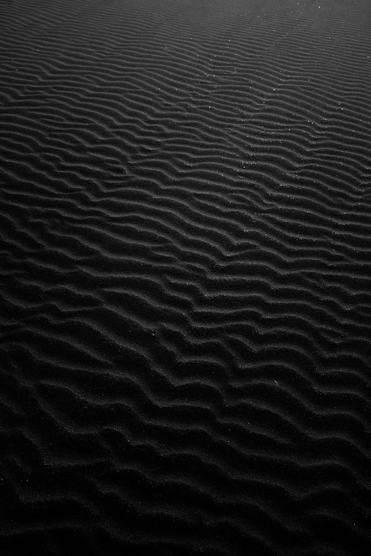 Ripples Of Sand In Black And White