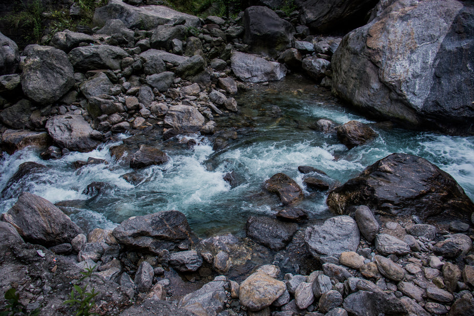 High Res River Cascading Through Rocks Picture — Free Images