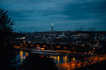 river side city at night time