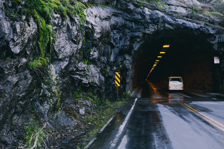 Road And Tunnel Through Mountain