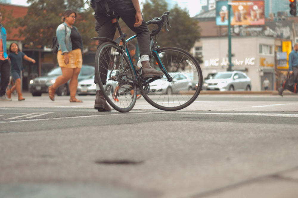 road bike and rider in city