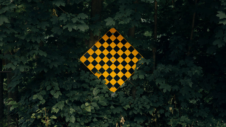 road-sign-meaning-dead-end-among-green-t