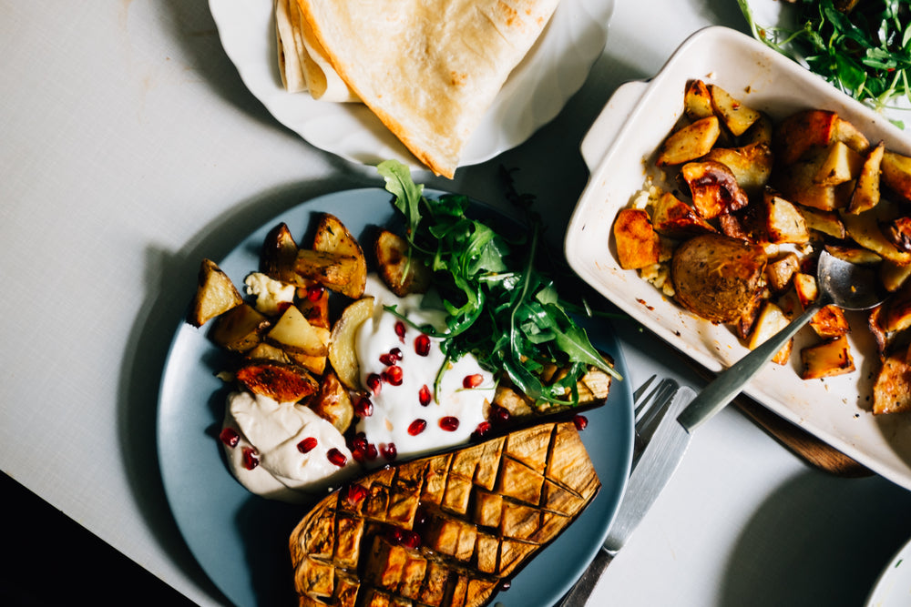 roasted squash and potatoes fill a plate