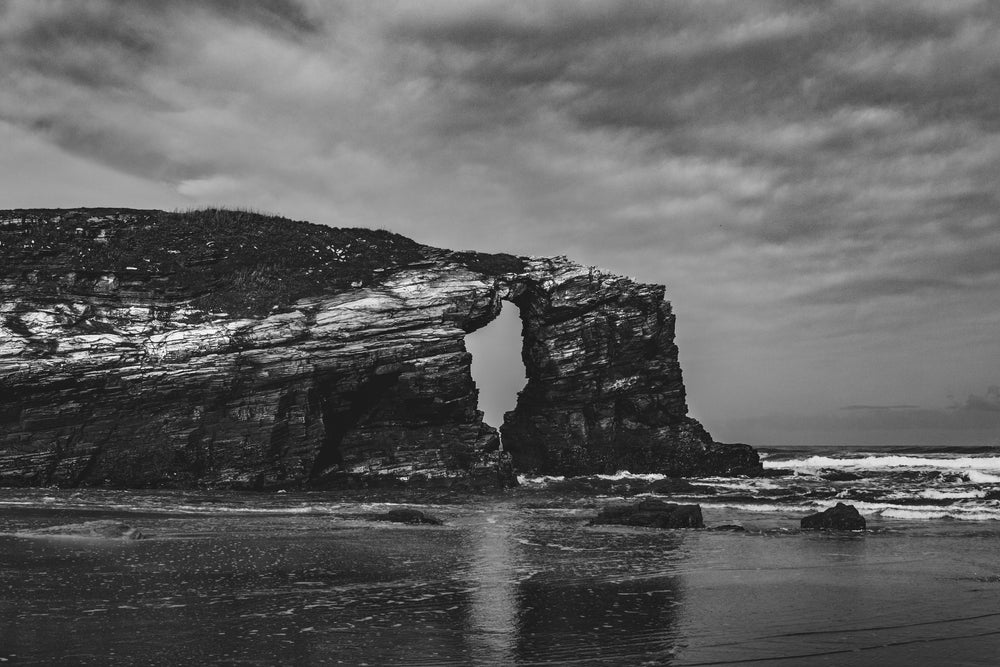 rock faces in black and white