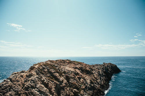 rocky cliff in ocean