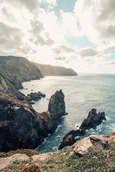 rocky cliff with the ocean below