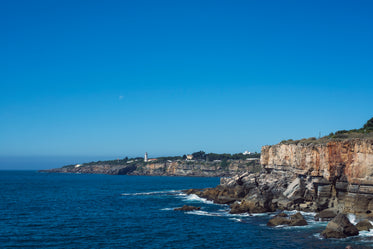 rocky cliffside dominates the scenery