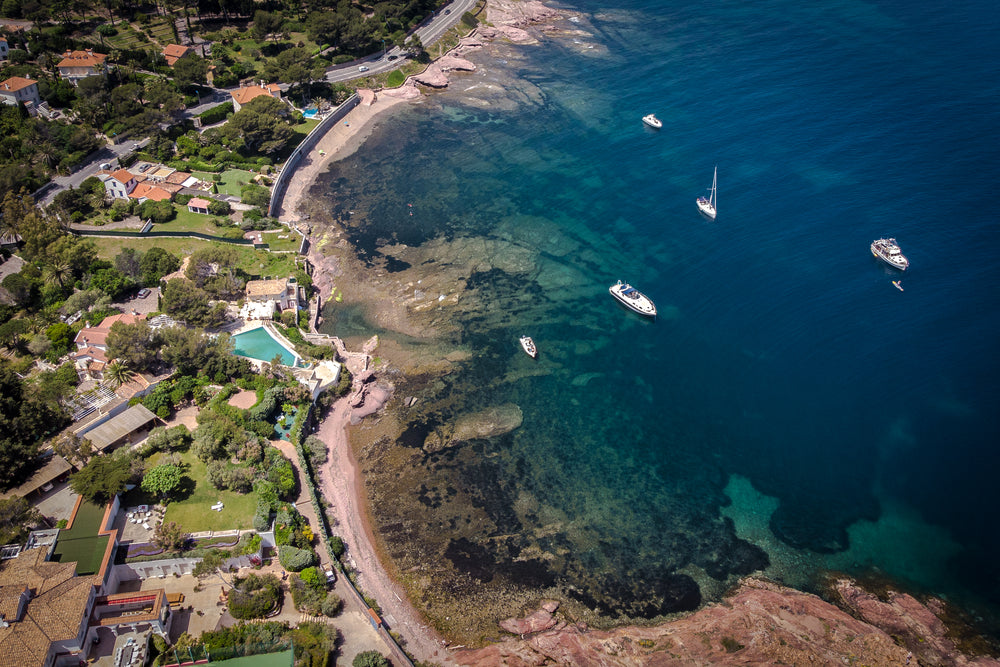 rocky coastline town with clear sea