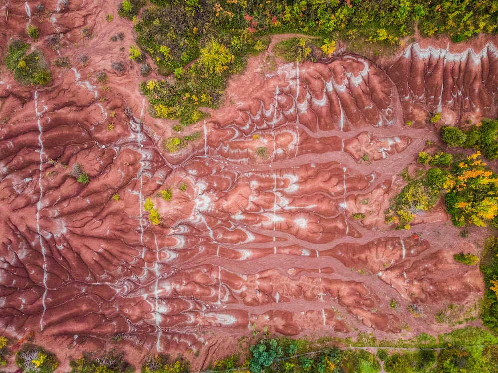 rolling hills and textures of red soil