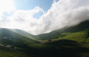 rolling hills patched with shadow