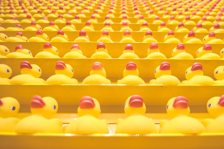 Rows Of Yellow Toy Ducks