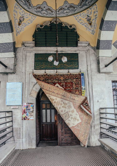 rug draped over front door