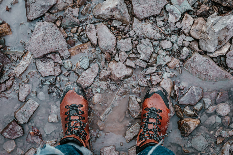 Browse Free HD Images of Rugged Hiking Boots Stood On Rocks