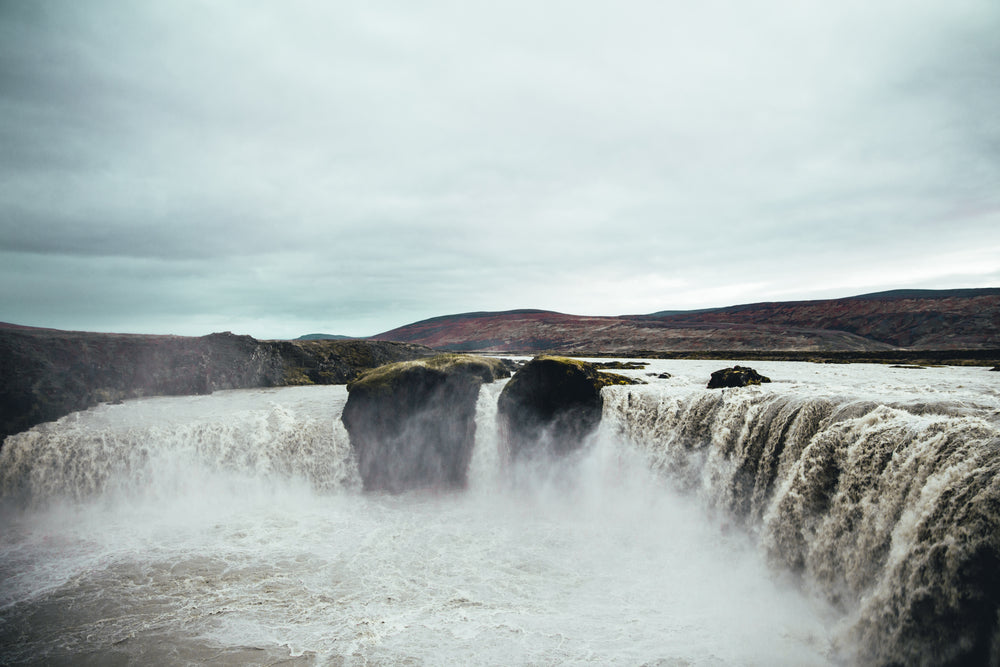 rushing waterfall in iceland