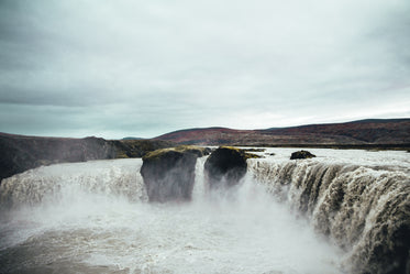 rushing waterfall in iceland