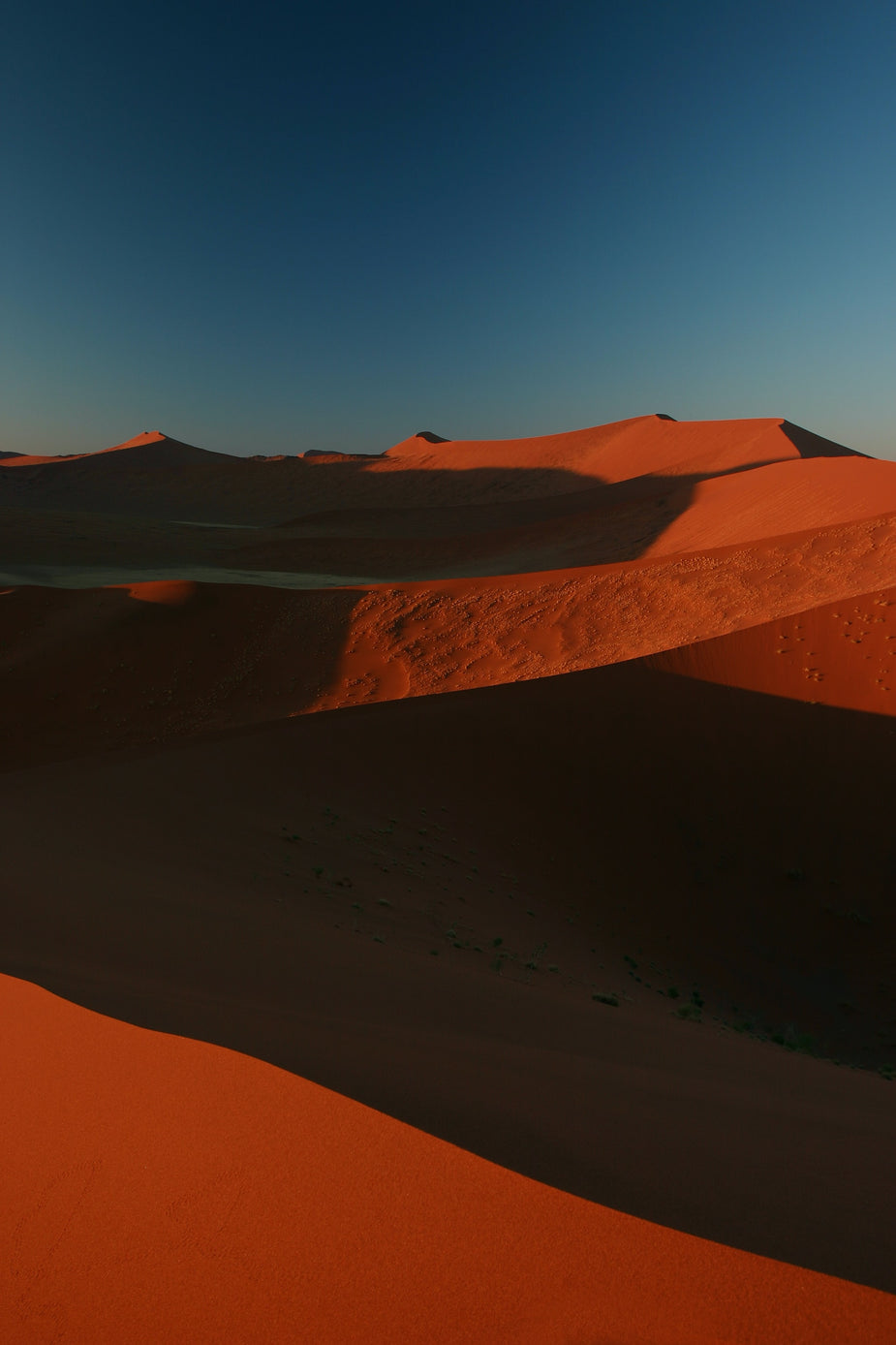 Browse Free HD Images of Rust Colored Sand Dunes Against A Deep Blue Sky