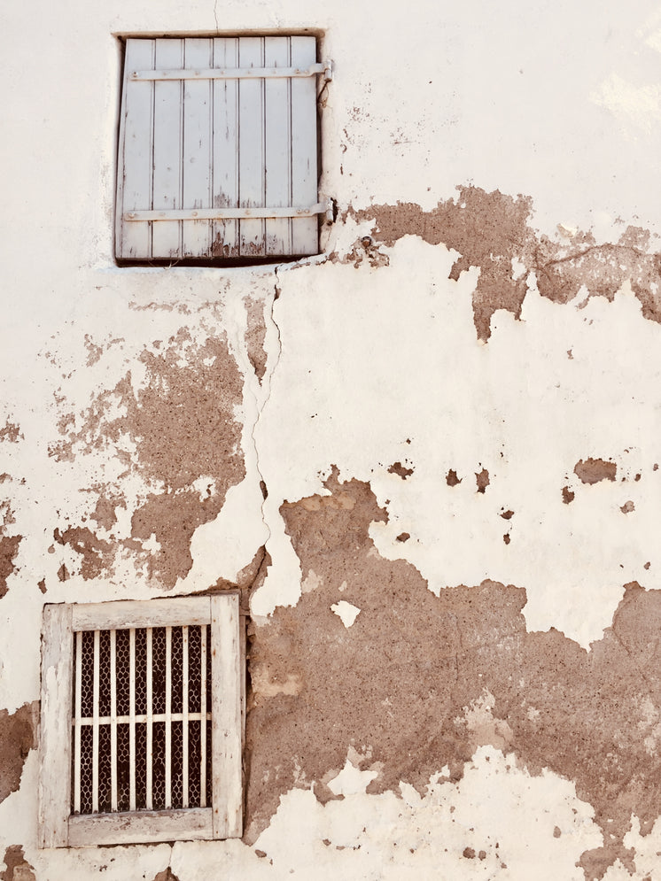 rustic-windows-and-shutters-on-plaster-w