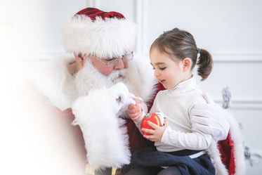 santa gives silver coin