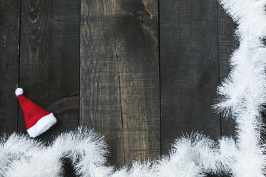 santa hat on woodgrain