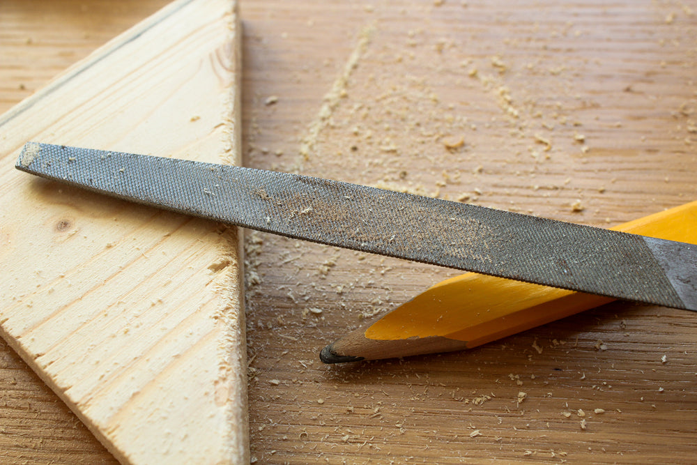 sawdust covers work bench and tools