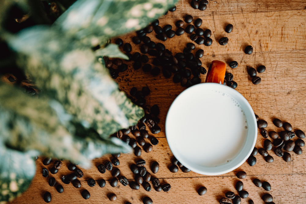 scattered coffee on a wooden table