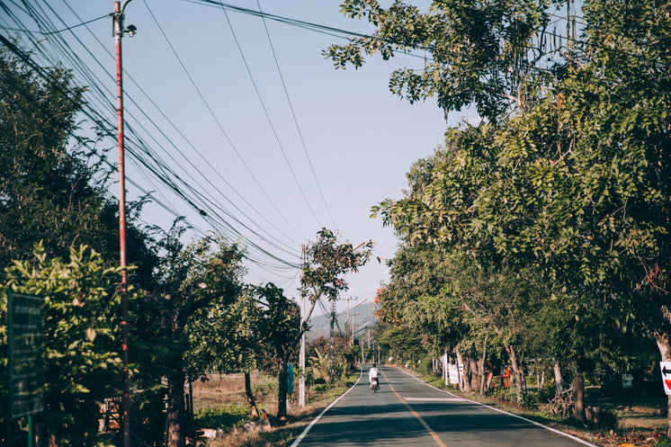 scooter-ride-through-small-village.jpg?w